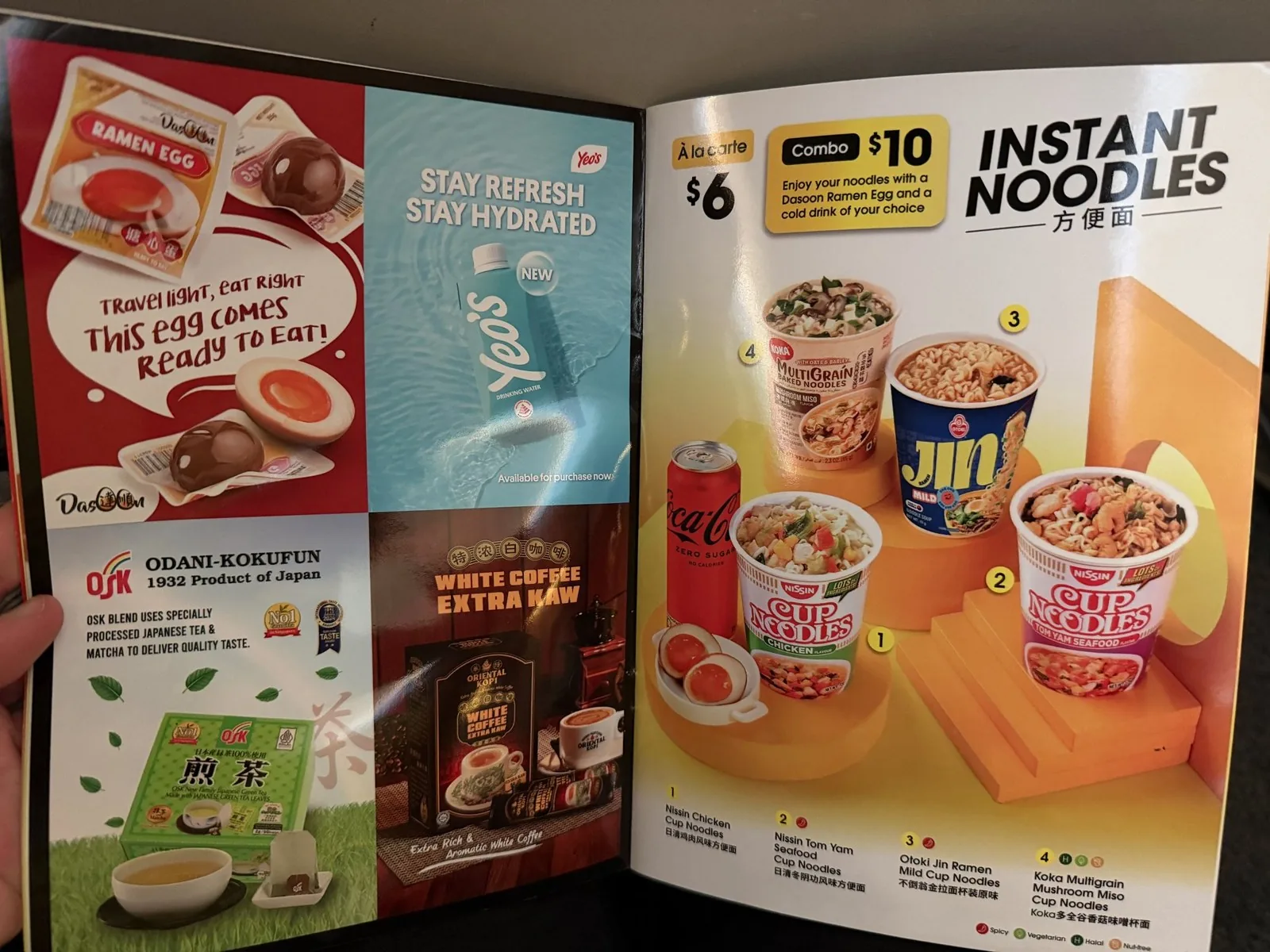 The cup noodle page of the in-flight menu, listing four kinds including Nissin Cup Noodle