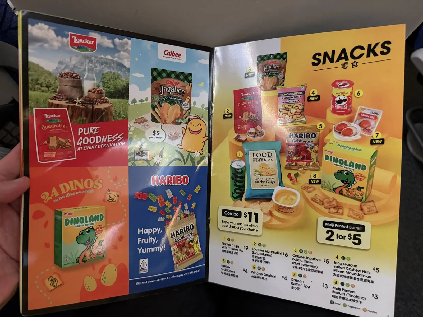 In-flight snack menu with photos and prices of snacks such as Jagabee, Haribo and Pringles